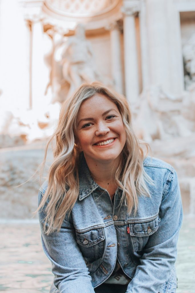 hungarian woman smiling wearing denim jacket