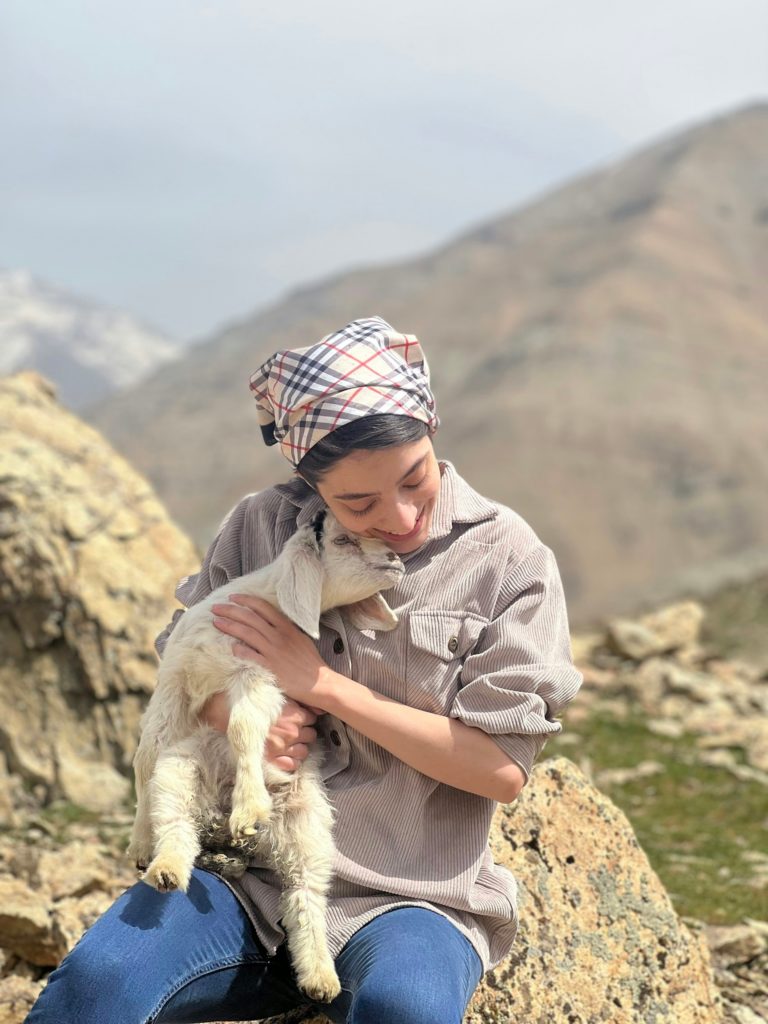 kyrgyzstan woman holding a dog