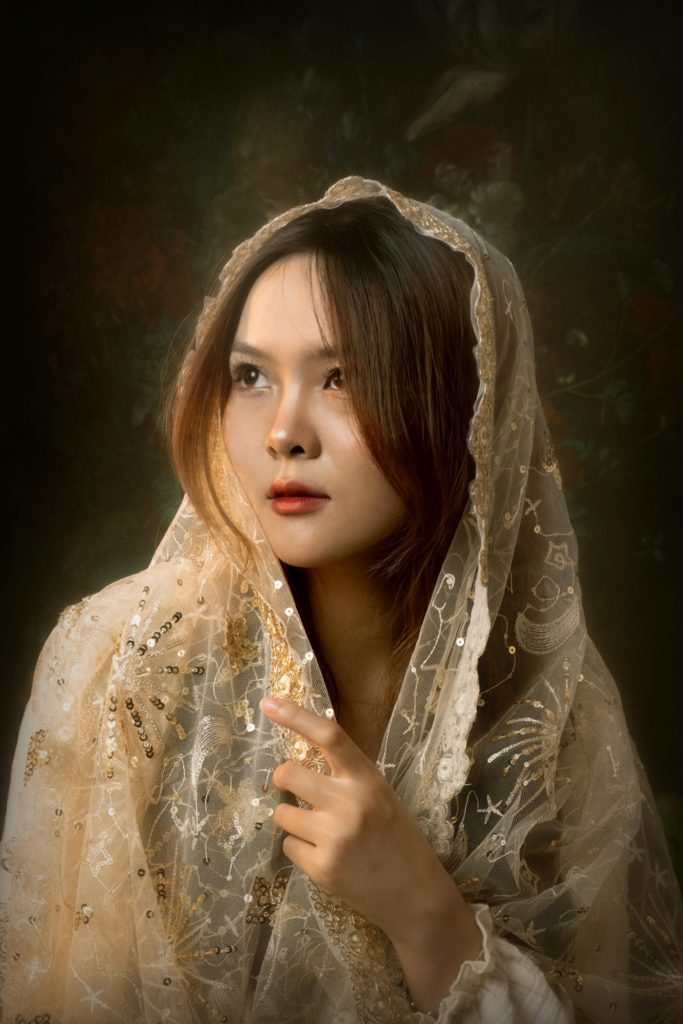 kyrgyzstan woman with a veil on her head