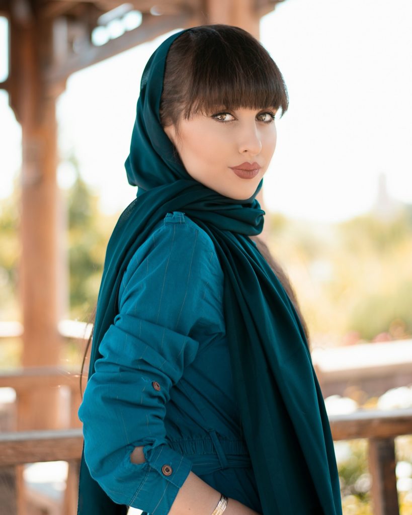 uzbekistan woman in blue hijab and blue long sleeve shirt