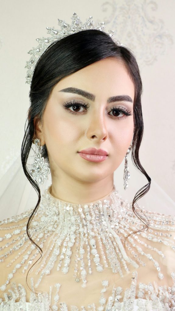 uzbekistan woman wearing a tiara and a veil
