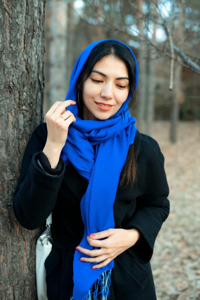 uzbekistan woman wearing a scarf and a scarf around the head